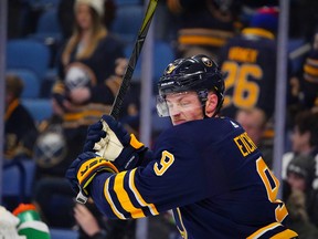 Jack Eichel of the Buffalo Sabres breaks his stick on the net after losing a game at the KeyBank Center in Buffalo.