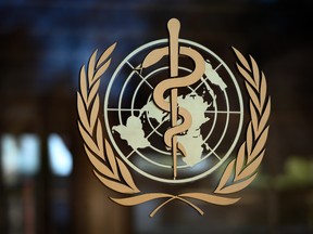 A photo taken on February 24, 2020 shows the logo of the World Health Organization (WHO) at their headquarters in Geneva. - Fears of a global coronavirus pandemic deepened on February 24, 2020 as new deaths and infections in Europe, the Middle East and Asia triggered more drastic efforts to stop people travelling. (Photo by Fabrice COFFRINI / AFP) (Photo by FABRICE COFFRINI/AFP via Getty Images)
