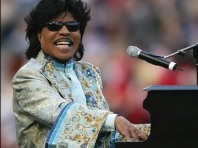 Musician Little Richard performs during the halftime show of the game between the Louisville Cardinals and the Boise State Broncos in the AutoZone Liberty Bowl on Dec.31, 2004 at the Liberty Bowl in Memphis, Tennessee.