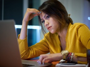 Pensive Girl College Student Studying At Night