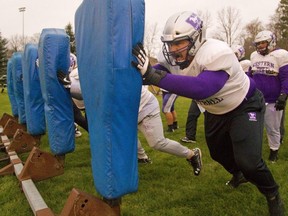 At 6-foot-8 and at one point 350 pounds, offensive lineman Dylan Giffen continues his fitness regimen during the coronavirus pandemic.  Mike Hensen/Postmedia Network