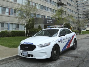 Police at the scene of a homicide and double shooting at 2743 Victoria Park Ave. Toronto Police have identified Shawn Williams, 34 as the 28th homicide of the year. Marcus Nugent, 30, of Toronto turned himself in and is charged with second-degree murder.