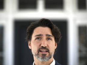 Prime Minister Justin Trudeau speaks during his daily news conference on the COVID-19 pandemic outside his residence at Rideau Cottage in Ottawa, on Sunday, May 3, 2020.