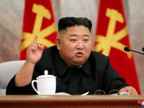North Korean leader Kim Jong Un speaks during the conference of the Central Military Committee of the Workers' Party of Korea in this image released by North Korea's Korean Central News Agency on Saturday, May 23, 2020.