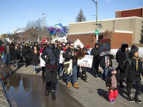 Canada's highest court agreed Thursday to review an Ontario ruling that could cause scores of criminal cases in that province to be thrown out over how changes to the jury selection process were applied. One of the cases that prompted the changes was the verdict in the shooting death of Colten Boushie of Saskatchewan. Protesters of that ruling are shown here.