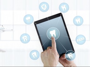 dentist hand touch digital tablet screen teeth icons and symbols on dental clinic with dentist's chair background web banner template contact us concept