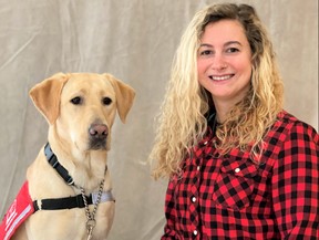 Caroline Cook with her hearing guide dog, Gracie.
