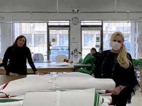 Famed Canadian fashion designer Ines Di Santo, in mask, along with her daughter, Veronica, have been creating fashionable PPE for front-line hospital workers.
