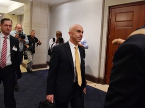 (FILES) In this file photo taken on Oct. 2, 2019, U.S. State Department Inspector General Steve Linick leaves after holding a briefing with lawmakers on Capitol Hill in Washington, D.C.