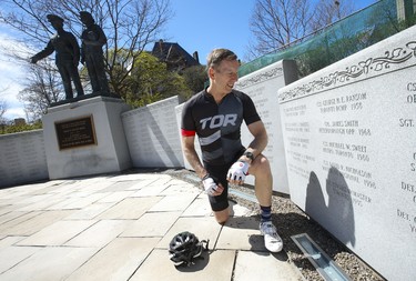 Toronto Police Staff-Sgt. Dave Gillis of 22 Division rode in on his bike from Etobicoke to the Ontario Police Memorial  beside Queens Park. Gillis showed up to take some images and remember slain office Const. Michael Sweet who died in the line of duty in 1980. Sunday May 3, 2020.