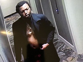 Toronto Police want the public's help in identifying this man, who was caught on CCTV before a fire broke out at 155 Balliol St. early Thursday morning. A dead man was discovered in the vicinity where the fire broke out. Homicide investigators have been called in.