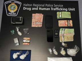 A drug trafficking investigation in Oakville led to three arrests and the seizure of an assortment of drugs and cash.