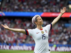 United States’ forward Megan Rapinoe celebrates scoring her team’s first goal during the France 2019 Women’s World Cup quarter-final football match between France and United States, on June 28, 2019, at the Parc des Princes stadium in Paris.