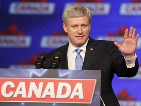 Stephen Harper speaks to Conservative supporters at the Telus Convention Centre in Calgary, Alta., on Monday, Oct. 19, 2015.