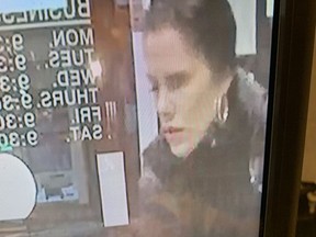Investigators needs help identifying a woman who allegedly spit, coughed and wiped her saliva on an ATM at a bank near Pape and Cosburn Aves., in East York, on Thursday, April 30, 2020.