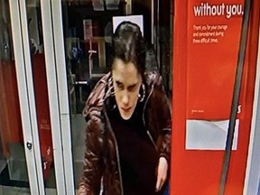 An image released by police in the search for a woman who allegedly spit, coughed and wiped her saliva on an ATM at a bank near Pape and Cosburn Aves., in Toronto on Thursday, April 30, 2020.