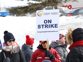 Teachers and support staff represented by the Ontario Secondary School Teachers' Federation take part in a one-day strike in Sudbury, Ont. on Friday, February 28, 2020.