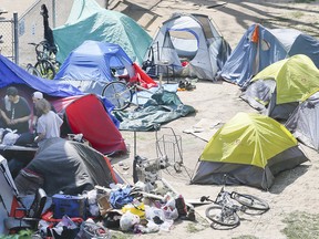 Homeless set up a tent city in George Hislop Park in downtown Toronto on Tuesday, May 26, 2020.