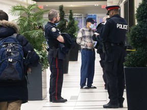 As Torontonians adjust to life during the Covid-19 pandemic; Toronto Police continue to respond to calls, this one at 345 Bloor Street East,  on Sunday March 29, 2020.