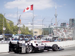 French driver Simon Pagenaud takes a turn on the way to taking pole position during the qualifying session for the Honda Indy Toronto on Saturday, July 15, 2017.