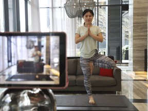 Maggie Duan, a yoga instructor, is using the internet and Zoom to offer yoga classes to frontline workers free or charge.