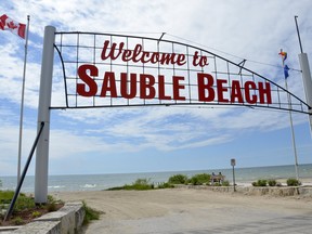 To the south (left) of this signat Sauble Beach is the northeast corner of Saugeen First Nation. The band is claiming 2.4 kilometres of beach north of the sign, to about the large washroom building at 6th Street.  (File photo)