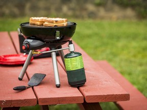 An integrated water pan to catch grease makes cleaning Coleman’s 4-in-1 grill easy.