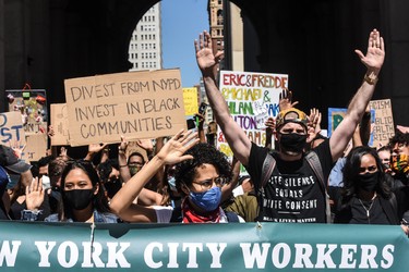 NEW YORK, NY - JUNE 08:  People protest outside of One Police Plaza on June 8, 2020 in New York City. More than 500 former and current mayor's office staff joined with city agency staff to demand policy reforms on the NYPD amid the nation-wide protests against police brutality and racial inequality.