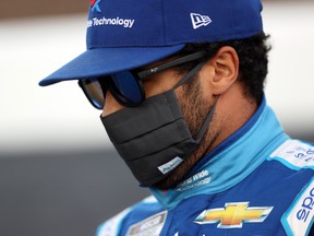 Bubba Wallace, driver of the #43 World Wide Technology Chevrolet, walks pit road prior to the NASCAR Cup Series Alsco Uniforms 500 at Charlotte Motor Speedway on May 28, 2020 in Concord, North Carolina. Wallace is the only full-time black driver in NASCAR's top circuit, and he hasn't been shy about pushing for progress in racial equality. The 26-year-old said in a CNN interview he's ready for racing to put action behind a vow to enact change and social justice by removing Confederate flags from racetracks.