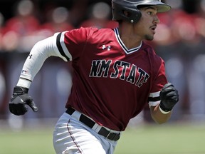 New Mexico State’s Nick Gonzales runs to first base during an NCAA college baseball game against Texas Tech. The second baseman could be taken by Blue Jays in the No. 5 slot in Wednesday’s MLB draft