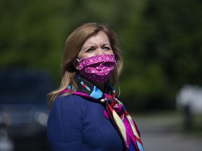Ontario Health Minister Christine Elliott attends a photo opportunity in which she joined Premier Doug Ford in handing out bagged gifts from Prince Edward Island for health-care workers at Birchmount Hospital in Toronto on Monday, June 8, 2020.