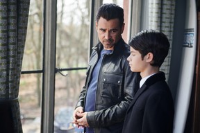 Colin Farrell’s Artemis Fowl senior and Ferdia Shaw’s junior Artemis Fowl share a quiet moment inside Fowl Manor.
