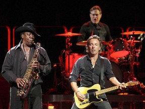Bruce Springsteen, saxophonist Clarence Clemons and drummer Max Weinberg perform at Scotiabank Place Oct. 14.