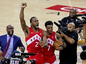 One year ago Toronto Raptors forward Kawhi Leonard (2) and Toronto Raptors guard Kyle Lowry (7) celebrate winning the NBA Championship over the Golden State Warriors.
