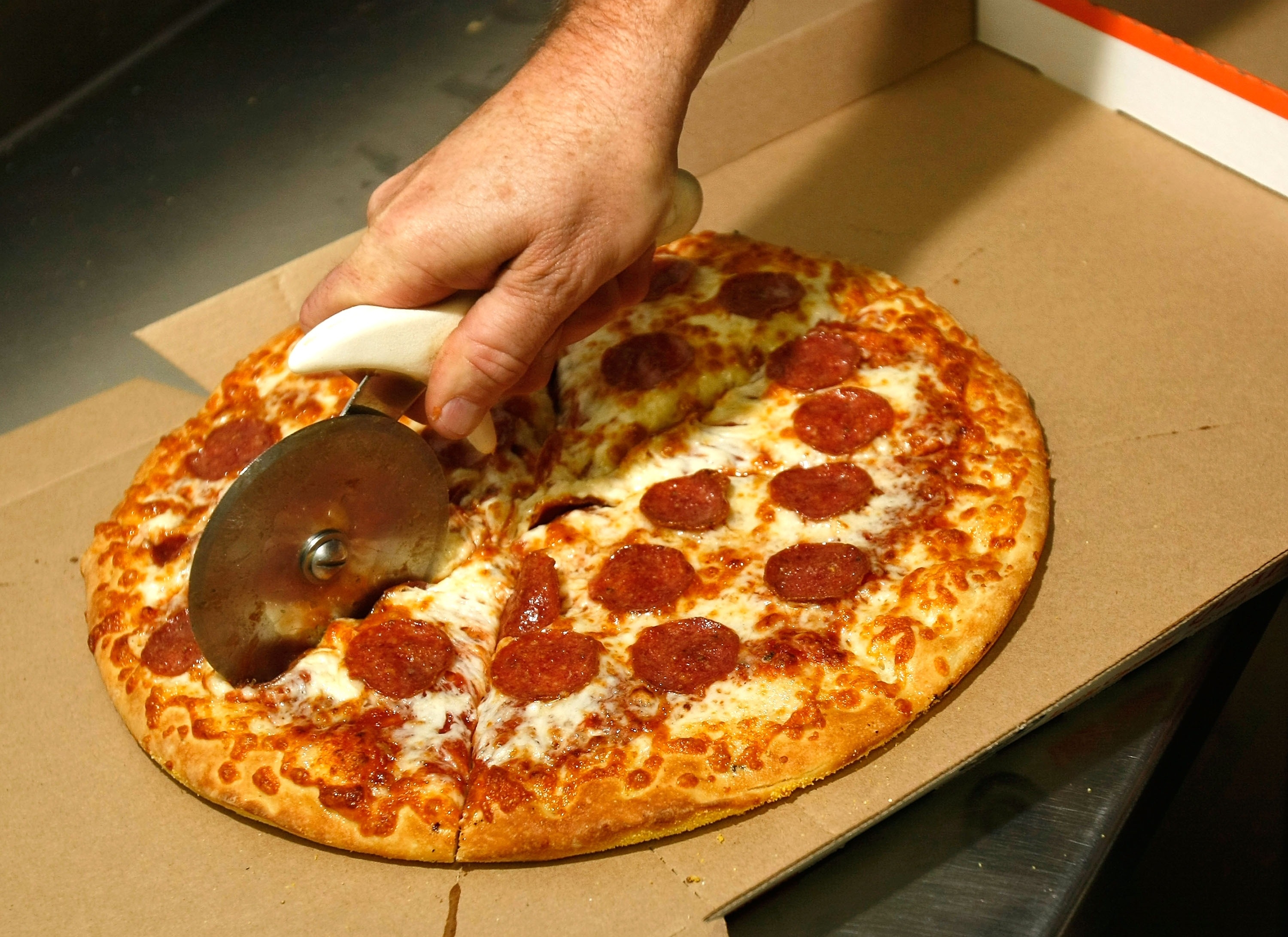 2 Brook Park, Ohio Little Caesars workers fired after putting swastika sign  on couple's pizza