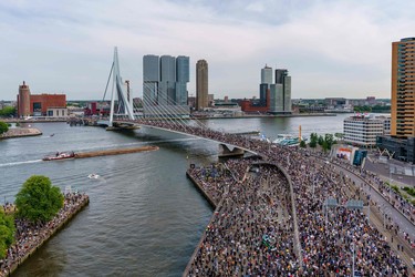 People gather at Erasmus Bridge during a protest on June 3, 2020, in solidarity with protests raging across the United States over the death of George Floyd, an unarmed black man who died during an arrest on May 25. - The United States has erupted into days and nights of protests, violence, and looting, following the death of George Floyd after he was detained and held down by a knee to his neck, dying shortly after.