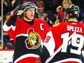 Daniel Alfredsson, celebrating his 600th career goal with linemate Jason Spezza, is looking to be inducted into the Hockey Hall of Fame in his fourth year of eligibility. Spezza, now on the Maple Leafs, feels the former Senators captain deserves the honour despite the fact his Ottawa teams enjoyed only limited post-season success.