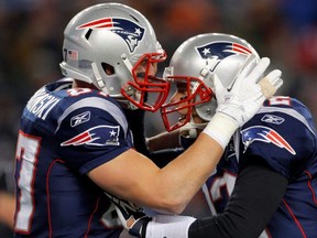 Players are being urged by the league and the PA to not get together between now and training camp. Quarterback Tom Brady (right) and his new Tampa Bay Buccaneers are not listening to that advice, continuing to practice on their own. Reuters