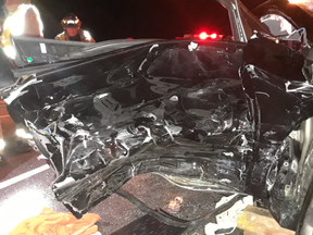 An image released of a vehicle damaged when a wheel came off a transport on Hwy. 401 on June 16, 2020.