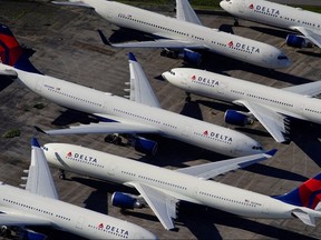 Delta planes are seen parked due to flight reductions made to slow the spread of coronavirus disease at Birmingham-Shuttlesworth International Airport in Birmingham, Alabama, March 25, 2020.