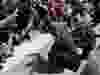 Toronto Police Chief Mark Saunders kneels in front of protesters during the “I Can’t Breathe” anti-racism rally in Toronto on June 5, 2020.