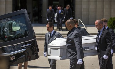 The casket of Klara Ciasullo  is loaded in a hearse after her funeral and that of her mother - Karolina  - and sisters Mila and Lilianna Ciasullo outside of St. Eugene de Mazenod Catholic Church in Brampton, Ont. on Thursday June 25, 2020.  The family members were killed in a tragic collision in Brampton on June 18. Ernest Doroszuk/Toronto Sun/Postmedia