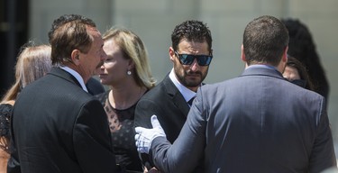 Michael Ciasullo (middle) leaves the church, after the funeral of his wife and children - Karolina, Klara, Lilianna and Mila Ciasullo, at St. Eugene de Mazenod Catholic Church in Brampton, Ont. on Thursday June 25, 2020.  The family members were killed in a tragic collision in Brampton on June 18. Ernest Doroszuk/Toronto Sun/Postmedia