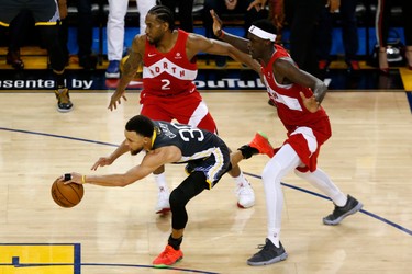 OAKLAND, CALIFORNIA - JUNE 13:  Stephen Curry #30 of the Golden State Warriors is fouled by Pascal Siakam #43 of the Toronto Raptors late in the second half during Game Six of the 2019 NBA Finals at ORACLE Arena on June 13, 2019 in Oakland, California.