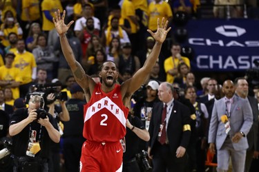 OAKLAND, CALIFORNIA - JUNE 13:  Kawhi Leonard #2 of the Toronto Raptors celebrates his teams win over the Golden State Warriors in Game Six to win the 2019 NBA Finals at ORACLE Arena on June 13, 2019 in Oakland, California.