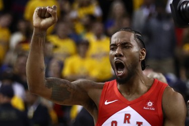 OAKLAND, CALIFORNIA - JUNE 13:  Kawhi Leonard #2 of the Toronto Raptors celebrates his teams win over the Golden State Warriors in Game Six to win the 2019 NBA Finals at ORACLE Arena on June 13, 2019 in Oakland, California.