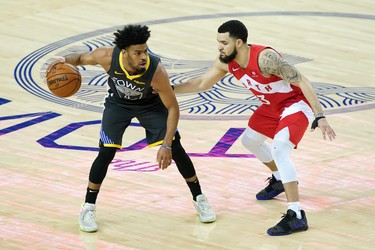 OAKLAND, CALIFORNIA - JUNE 13:  Quinn Cook #4 of the Golden State Warriors is defended by Fred VanVleet #23 of the Toronto Raptors in the second half during Game Six of the 2019 NBA Finals at ORACLE Arena on June 13, 2019 in Oakland, California.