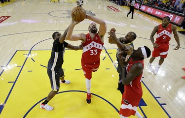 OAKLAND, CALIFORNIA - JUNE 13:  Marc Gasol #33 of the Toronto Raptors attempts a shot against the Golden State Warriors during Game Six of the 2019 NBA Finals at ORACLE Arena on June 13, 2019 in Oakland, California.