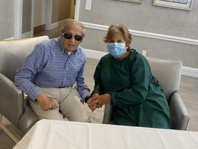 Sun columnist Sue-Ann Levy visits with her dad, Lou, in his care home on Tuesday, June 23, 2020. It was their first visit in four months.