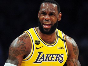 Los Angeles Lakers forward LeBron James reacts against the Milwaukee Bucks during the second half at Staples Center in Los Angeles on March 6, 2020.